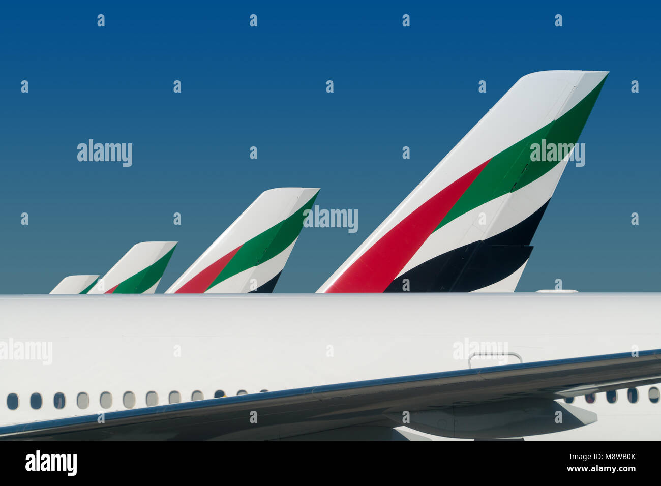 DUBAI - DECEMBER 12, 2017: Emirates airplane planes docked at Dubai International Airport on december 12, 2017 in Dubai, UAE. Stock Photo