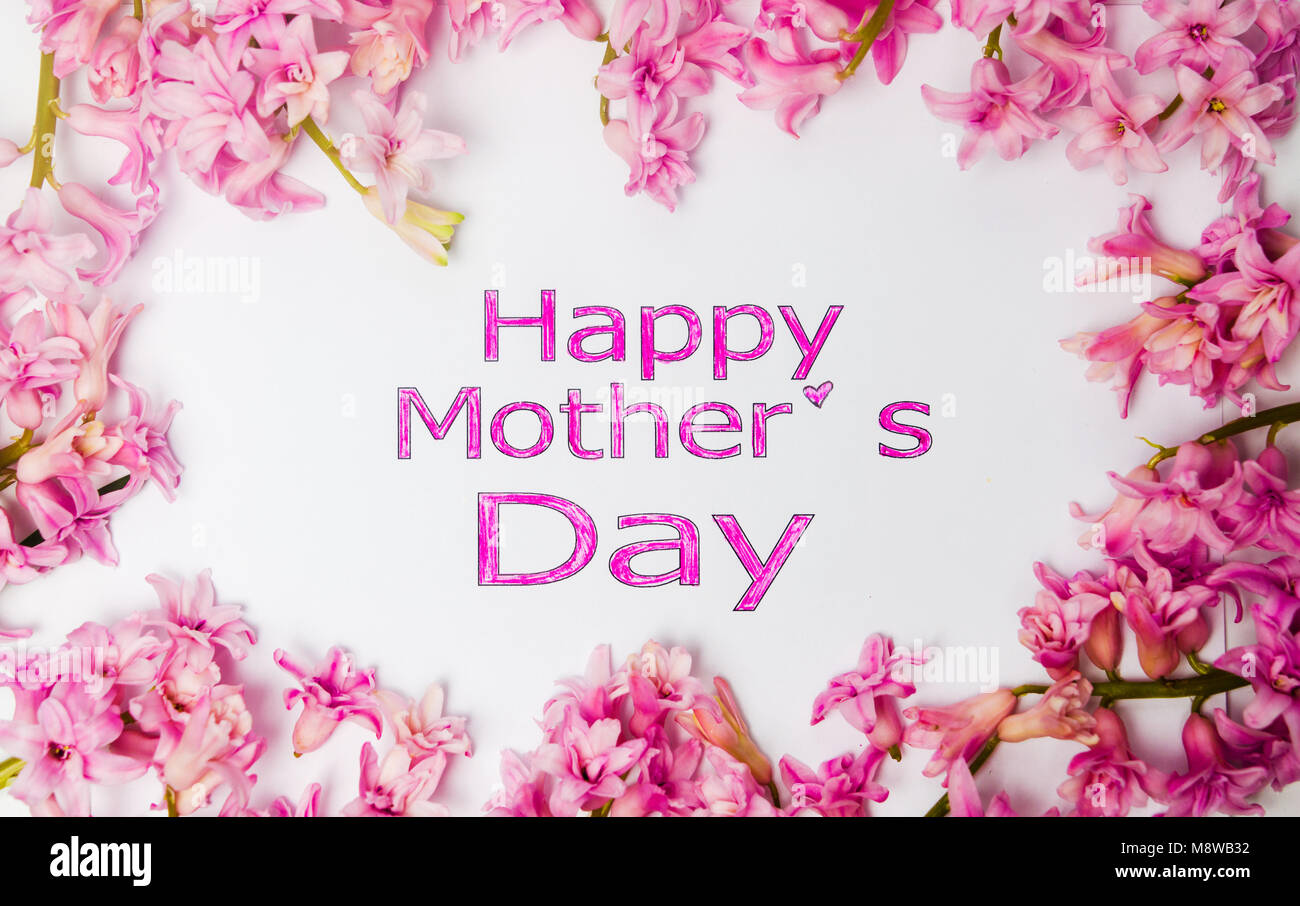 Happy mothers day card with fresh spring flowers Stock Photo