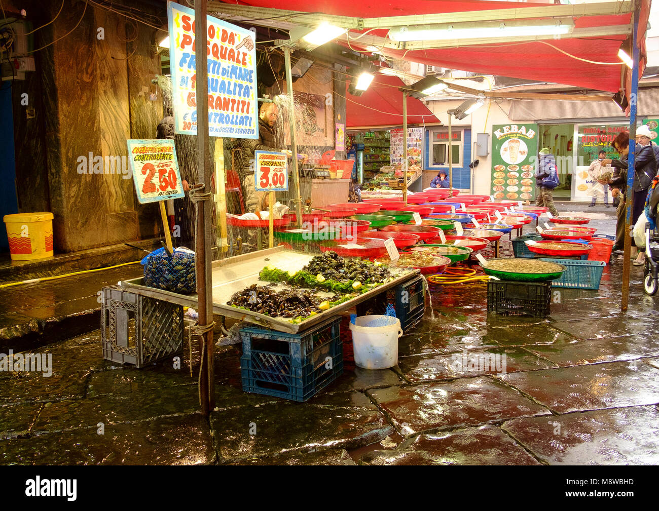 Fresh shellfish for sale on Via Sopramuro - the food market streets near Porta Nolana, Naples Stock Photo