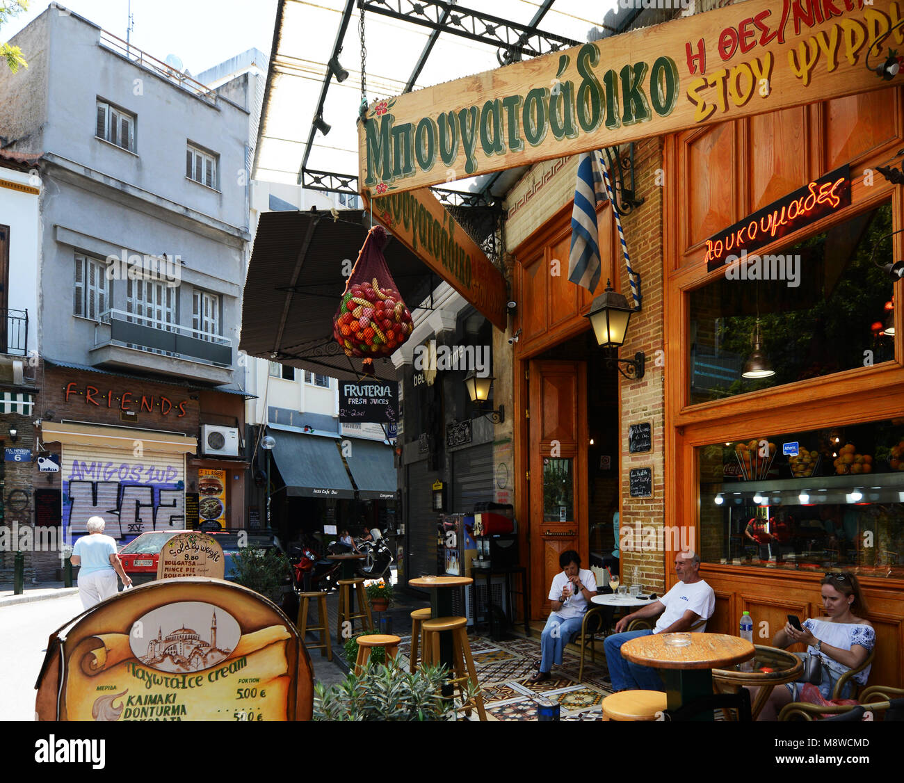 A colorful Greek Tavern in central Athens Stock Photo Alamy