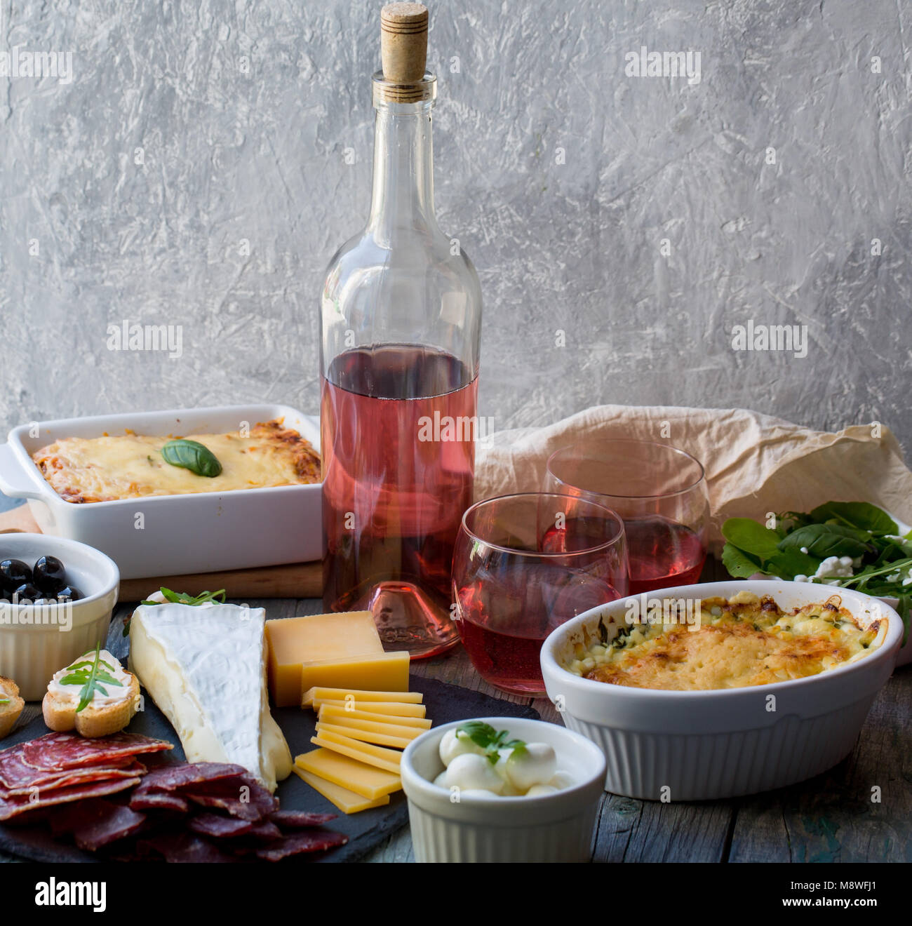 Assortment of delicacies with wine Stock Photo Alamy