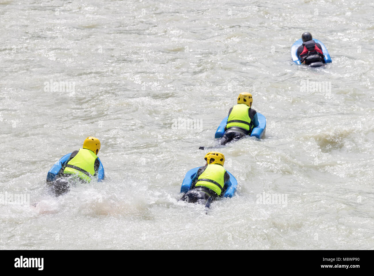 Group of people on river bugs in white water, active vacations, team concept Stock Photo