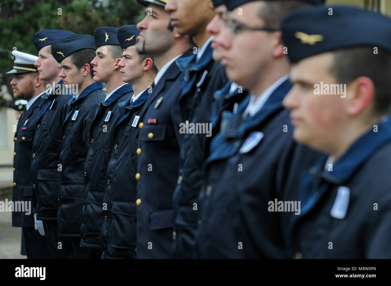 Amberieu-en-Bugey, France, 20th March 2018: Young volunteers for Military service (CSMV) are seen at Air Detachment 278 Base, in Amberieu-en-Bugey (Central-Eastern France), on March 20, 2018, as they receive military calot on the occasion of a symbolic ceremony paying homage to their engagement. The CSMV (Voluntary Military Service Center) of Amberieu-en-Bugey launched for the year 2018 a large campaign of recruitment. These young people, alienated from the workplace, will receive human,  behavioral and citizenship and training that will make them ready to integrate jobs in emplyment sectors l Stock Photo