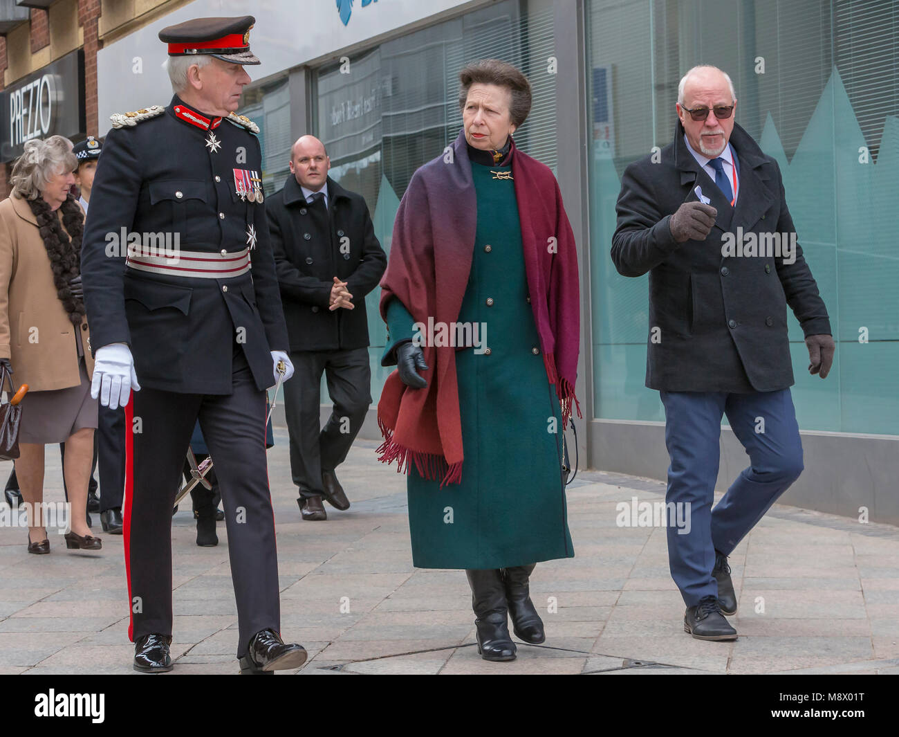 Warrington, UK. 20th Mar, 2018. HRH Princess Anne attends 25 year anniversary of IRA bomb, Warrington. Colin Parry leads Her Royal Highness Princess Anne, The Princess Royal and Thomas David Briggs, MBE, KstJ, Lord Lieutenant of Cheshire (Executive Chair) Credit: John Hopkins/Alamy Live News Stock Photo