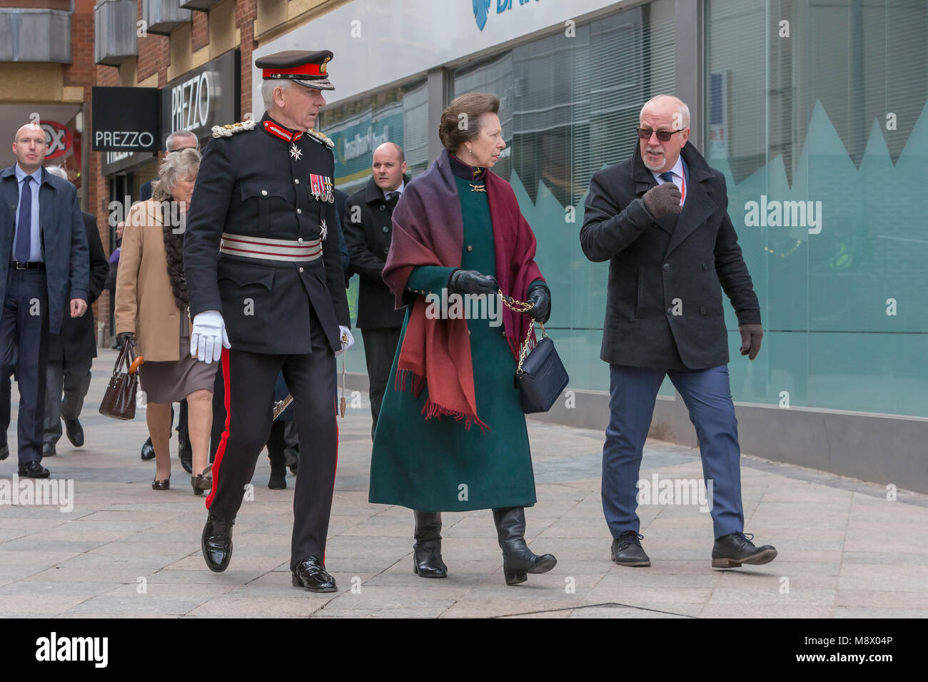 Warrington, UK. 20th Mar, 2018. HRH Princess Anne attends 25 year anniversary of IRA bomb, Warrington. Colin Parry leads Her Royal Highness Princess Anne, The Princess Royal and Thomas David Briggs, MBE, KstJ, Lord Lieutenant of Cheshire (Executive Chair) Credit: John Hopkins/Alamy Live News Stock Photo