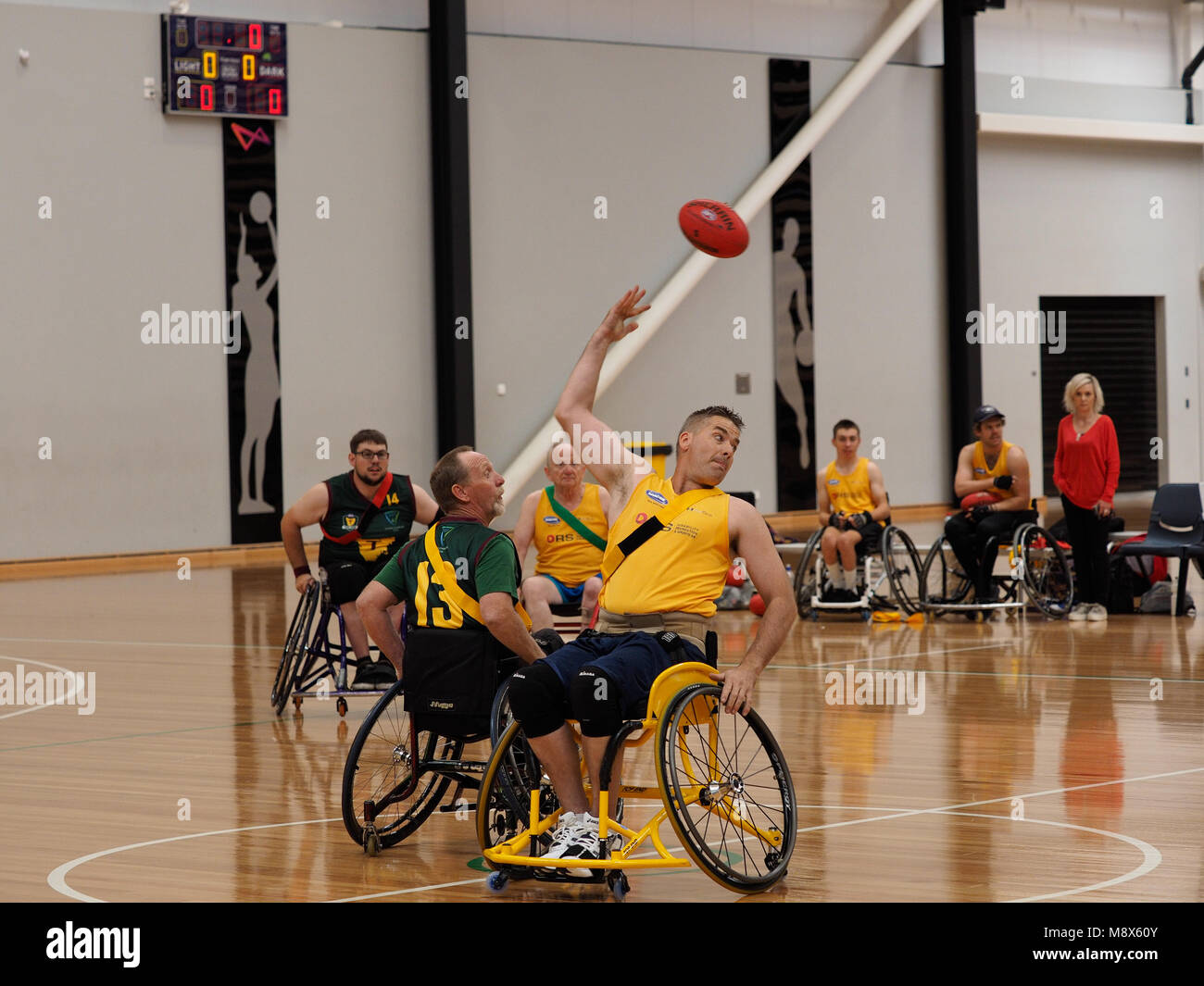 Melbourne, Australia. 21st March, 2018. Melbourne2018 Wheelchair Aussie Rules National Championship, opening pool game South Australia vs Tasmania. Credit Bill Forrester/Alamy Live News Stock Photo