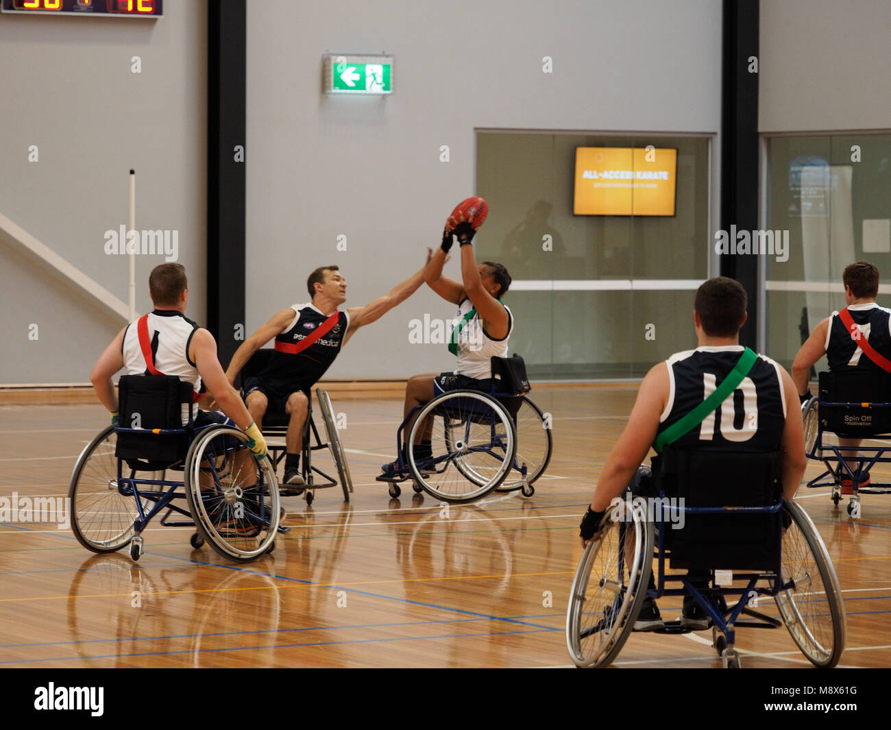 Melbourne, Australia. 21st March 2018. 2018 Wheelchair Aussie Rules National Championship, Australian Defence Force 1 vs Australian Defence Force 2. Credit W Forrester/Alamy Live News Stock Photo