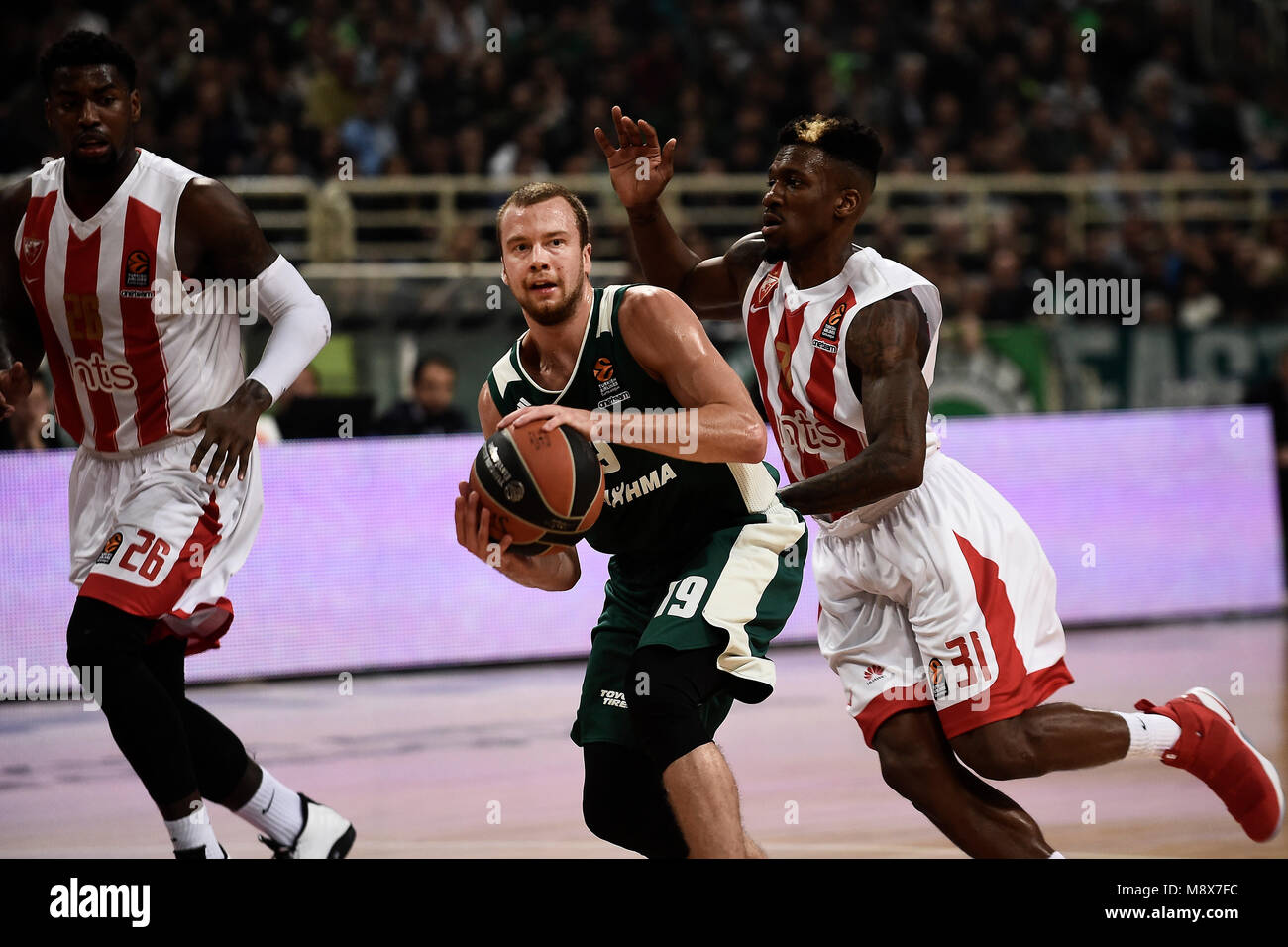 20 March 2018, Greece, Athens: Basketball, Euroleague, Panathinaikos Athens vs Red Star Belgrade: Lukas Lekvicius (l) of Panathinaikos and Dylan Ennis of Red Star vie for the ball. Photo: Angelos Tzortzinis/dpa Stock Photo
