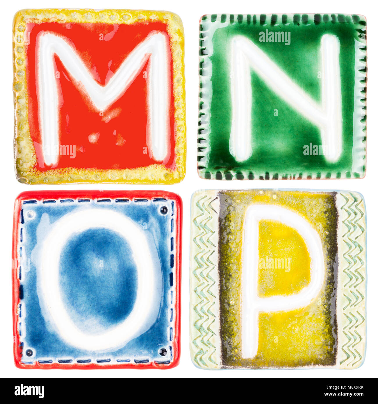 Colorful handmade ceramic letters isolated on white background Stock