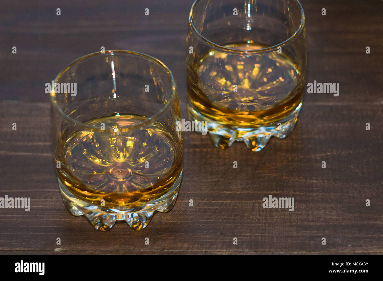 A glass of whiskey close-up. View at an angle. Whiskey without ice Stock Photo