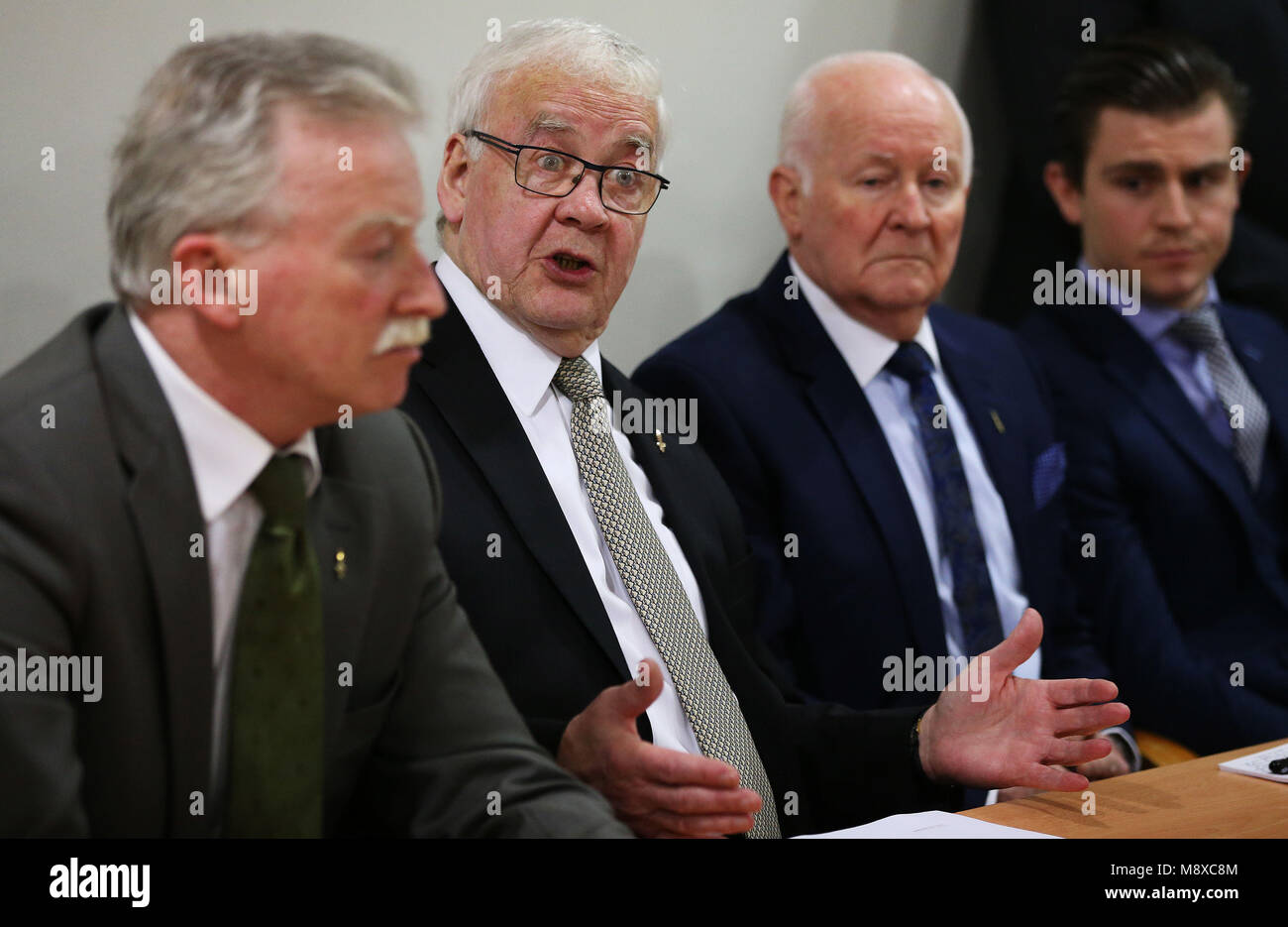 Francie McGuigan (second left), one of the 14 'Hooded' men, who were kept in hoods interned in Northern Ireland in 1971, during a press conference at KRW Law in Belfast, after the European Court of Human Rights delivered its judgement on the treatment of the 'Hooded' men. Stock Photo