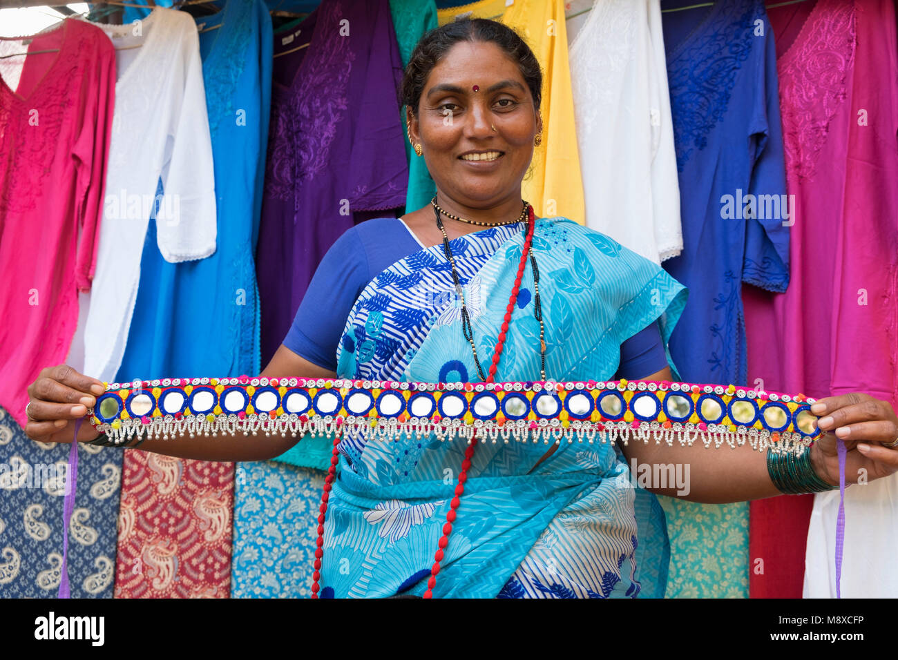 Indian lady with decorative belt Colva Goa India Stock Photo