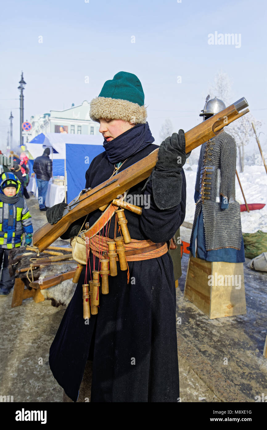 Editorial. Omsk,Russia - February, 18 2018. Lenina street, Maslenitsa Shrovetide celebration Exposition of ancient weapons Stock Photo