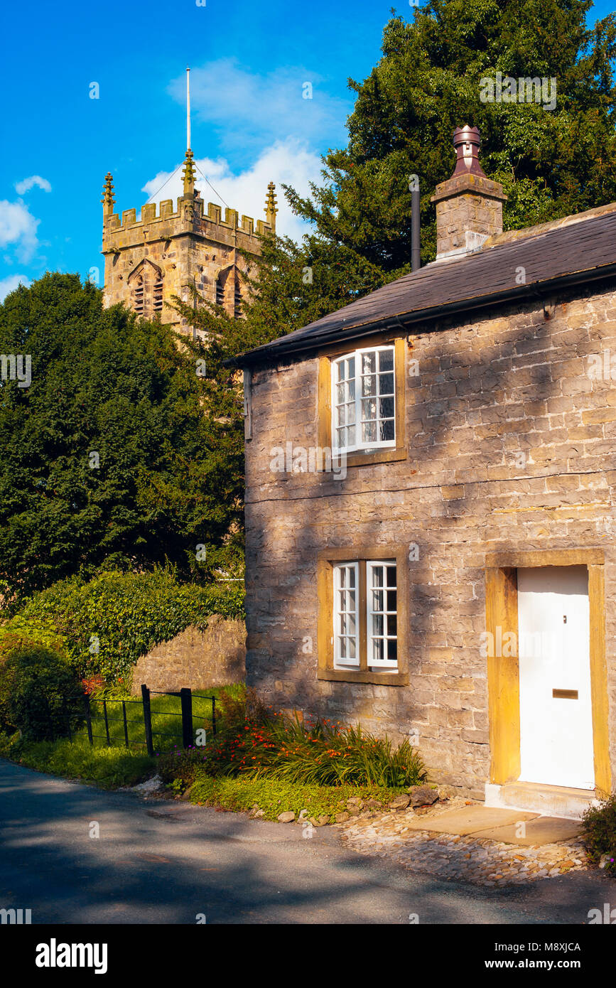 Cottage and church tower at Bolton-by-Bowland in the Ribble Valley Lancashire Stock Photo