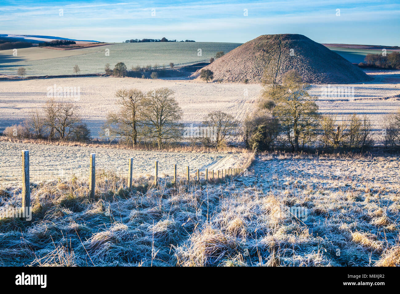 A frosty morning at Silbury Hill in Wiltshire. Stock Photo