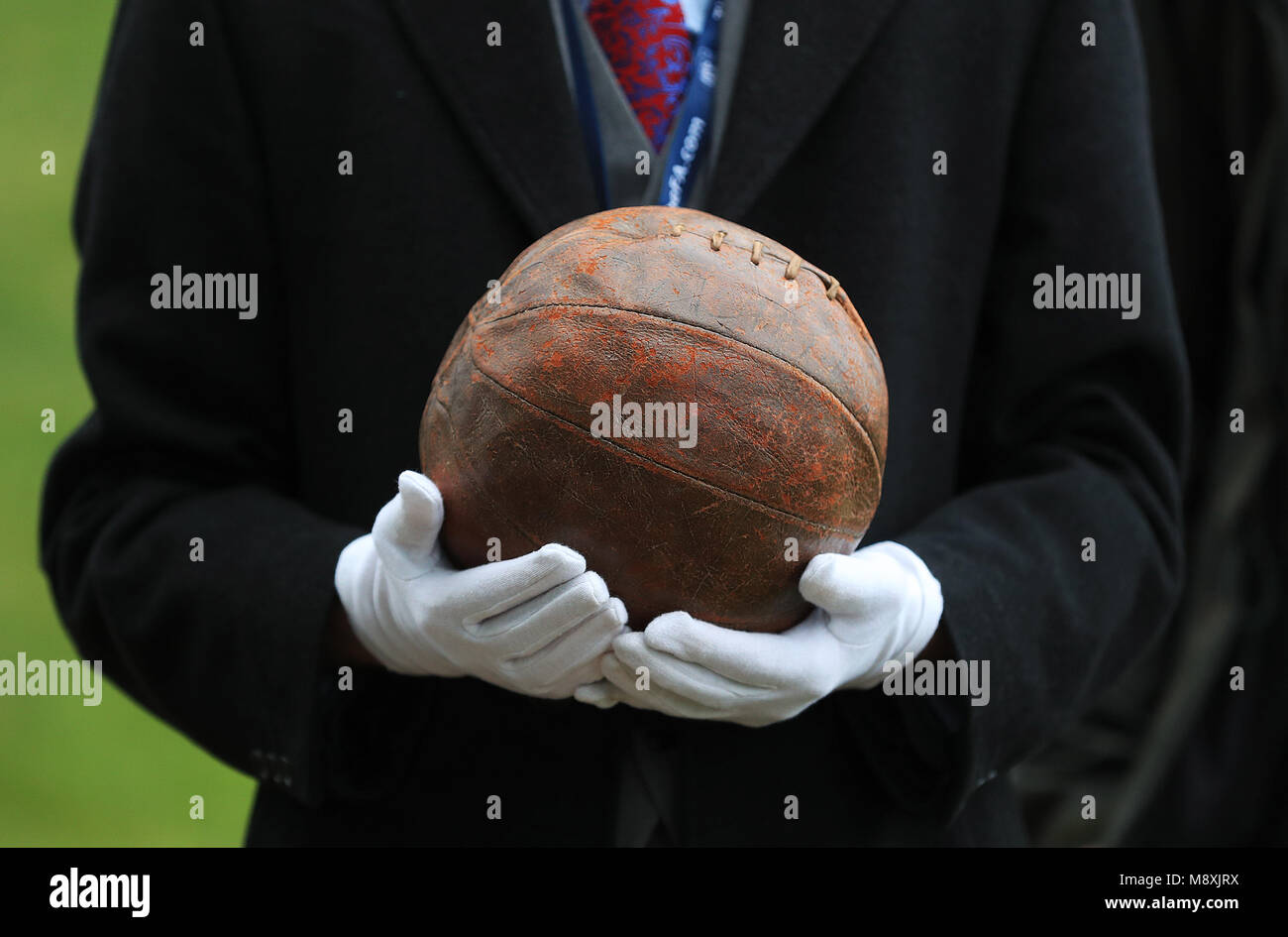 The only known surviving Somme football, the ball 'kicked over the top', from The National Football Museum during the media day at St George's Park, Burton. England players from the senior men's, women's and development teams will plant 14 trees at St. George's Park to remember the 14 England International footballers involved in the First World War, kicking off a partnership between The FA, Woodland Trust and National Football Museum. Stock Photo