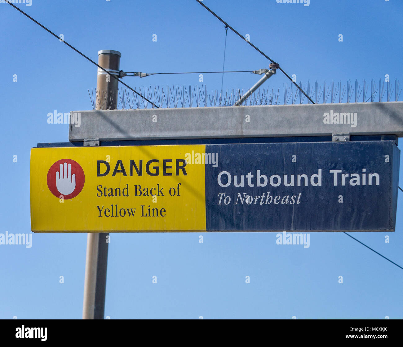 Danger Stand Back of Yellow Line Stock Photo