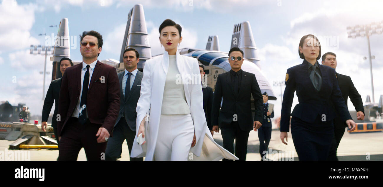 PACIFIC RIM UPRISING, from left: Charlie Day, JING Tian, Rinko Kikuchi,  2018. © Universal Pictures/courtesy Everett Collection Stock Photo - Alamy