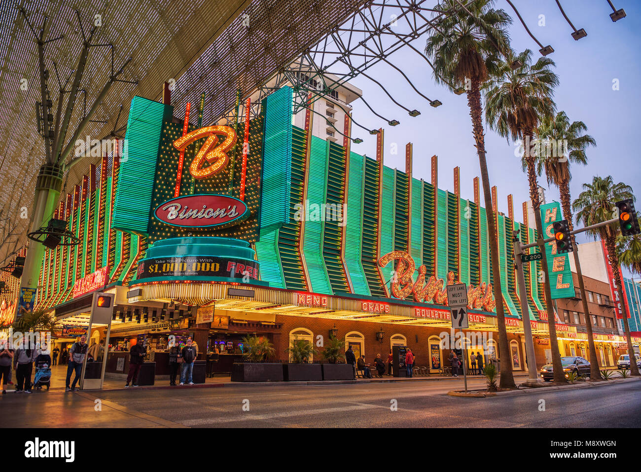 Fremont Street with many neon lights and tourists in Las Vegas Stock Photo