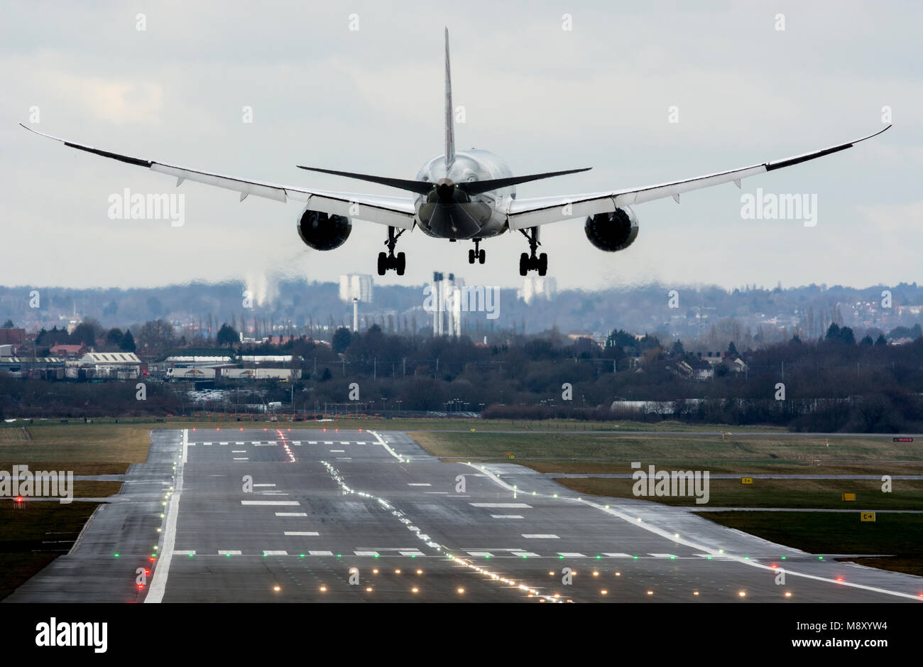 Qatar Airways Boeing 787 Dreamliner landing at Birmingham Airport, UK (A7-BCV) Stock Photo