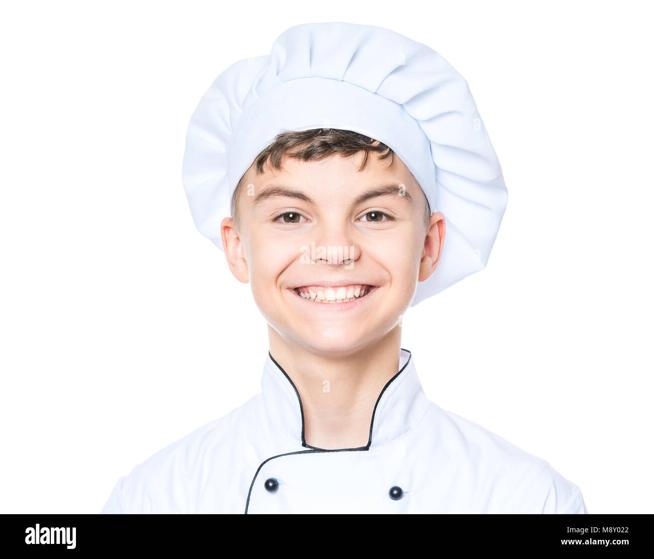 Teen boy wearing chef uniform Stock Photo Alamy