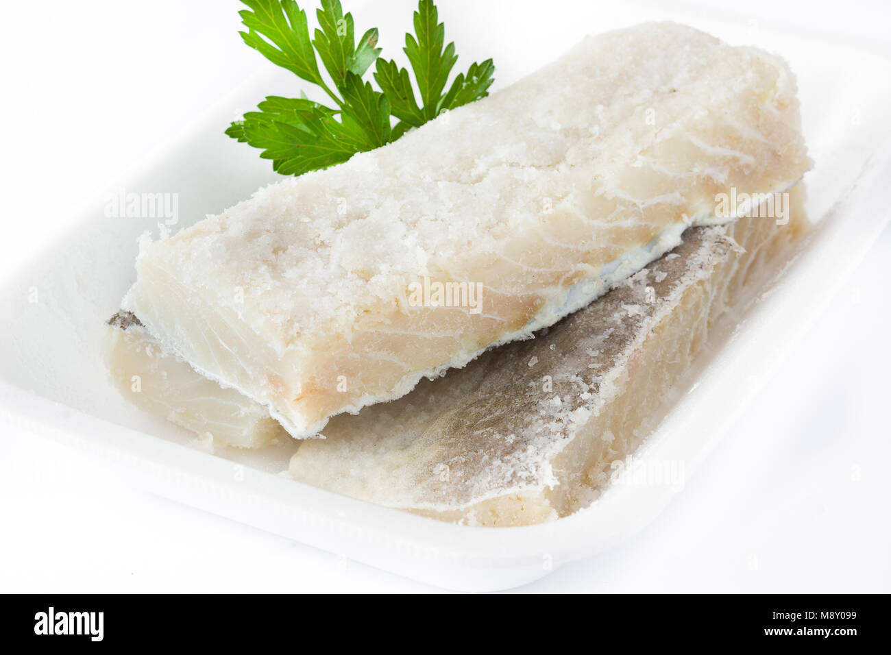 Salted dried cod isolated on white background. Typical Easter food ...