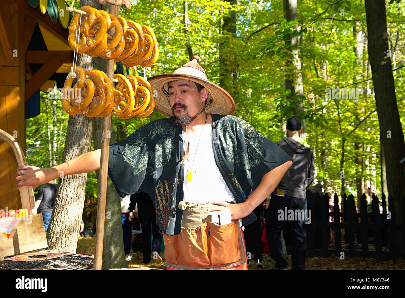 Vendor dressed in Period clothes at Renaissance Festival Stock Photo