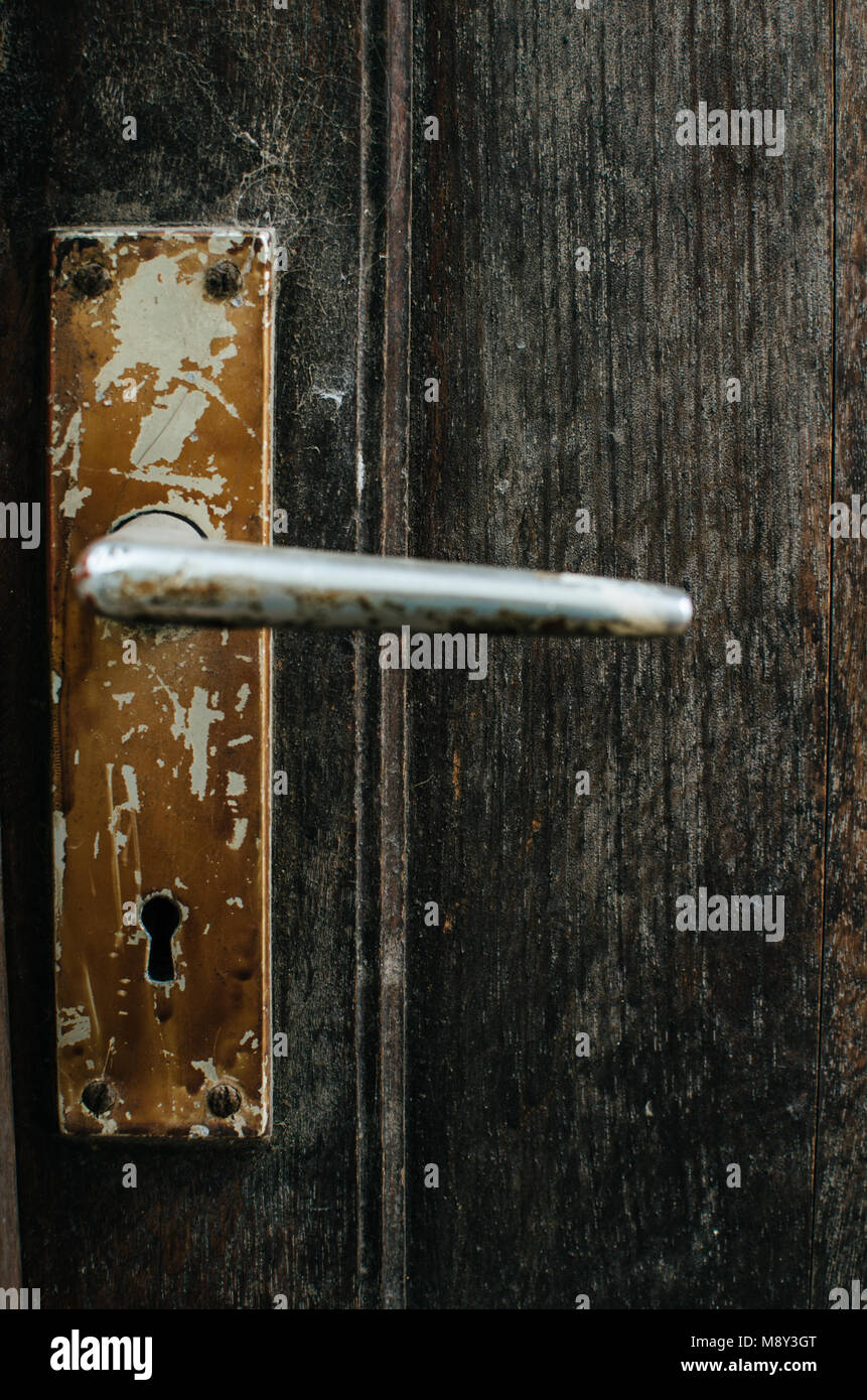 Antique handle of a wooden door Stock Photo Alamy