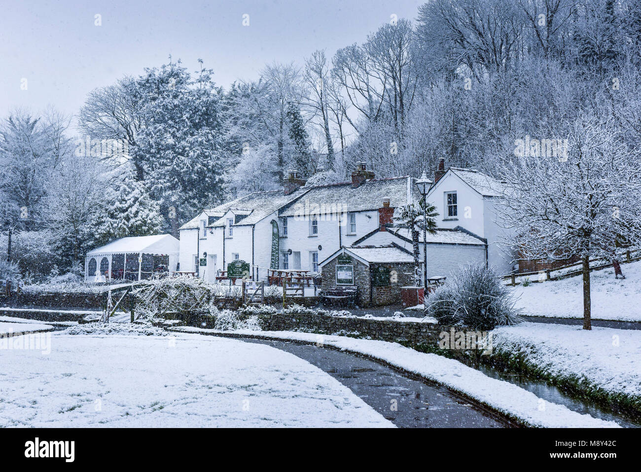 Snowing over the Trenance Heritage Cottages in Trenance Gardens Newquay Cornwall. Stock Photo