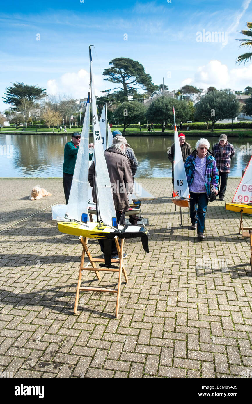 Model yachts belonging to members of the Newquay Model yacht Club at Trenance Lake in Newquay Cornwall. Stock Photo