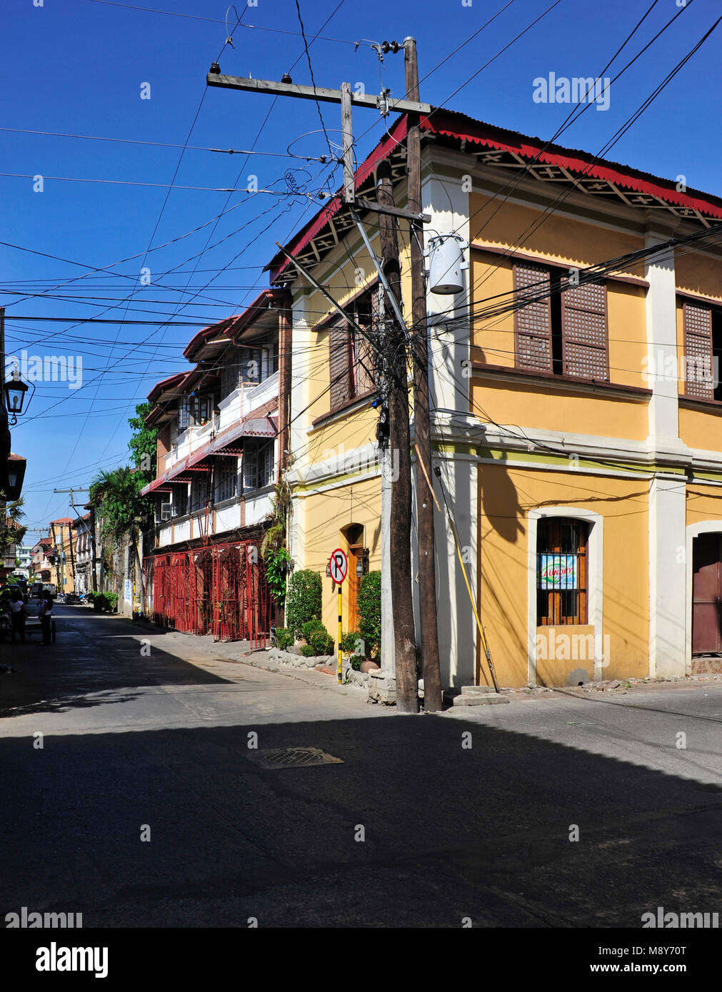 Buildings on a street corner of Vigan city, Ilocos Sur, Philippines Stock Photo