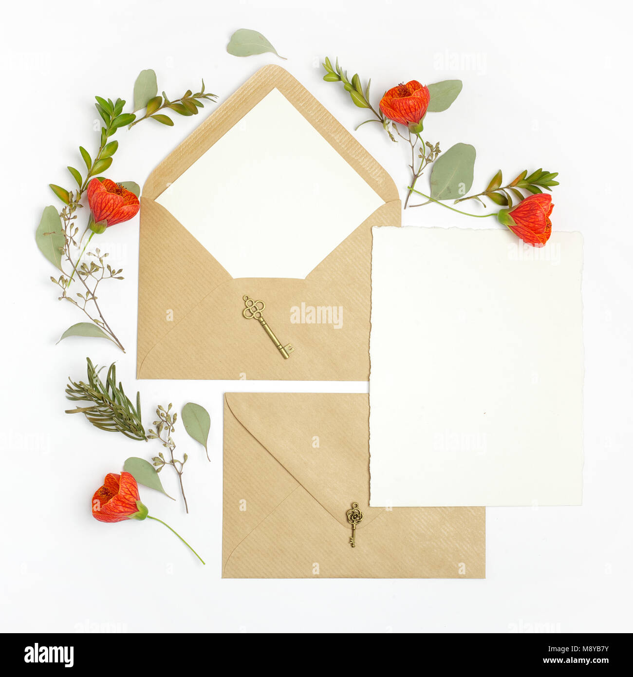 Flat lay shot of letter and eco paper envelope on white background. Wedding  invitation cards or love letter with plant. Valentine's day or other holid  Stock Photo - Alamy