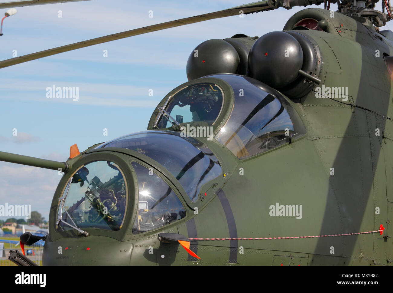 The Polish Air Force Mil Mi-24D Hind-D tandem cockpit during International Air Show at the 90th Jubilee of The Polish Air Force Academy. Stock Photo