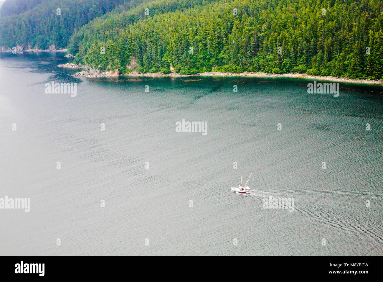 Aerial view of fishing boat off Chichagof Island in Lisianski Inlet near Pelican, AK Stock Photo