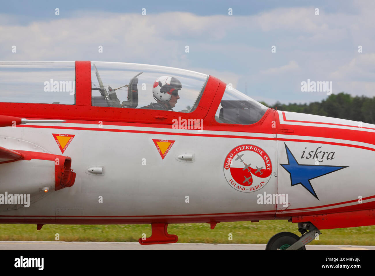 The Polish Air Force TS-11 Iskra MR of White-Red Sparks (Bialo-Czerwone Iskry) aerobatics team during International Air Show. Stock Photo