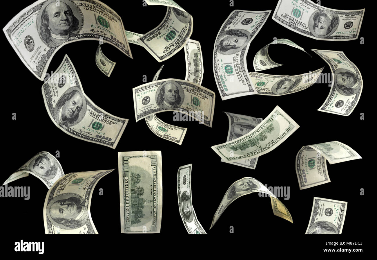 Money Falling From The Sky Over A Black Background Stock Photo Alamy