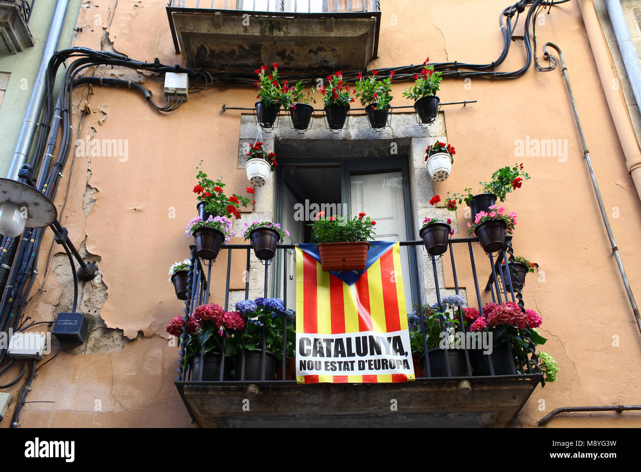 Catalan flags placed on balconies the day of National Day of Catalonia Stock Photo