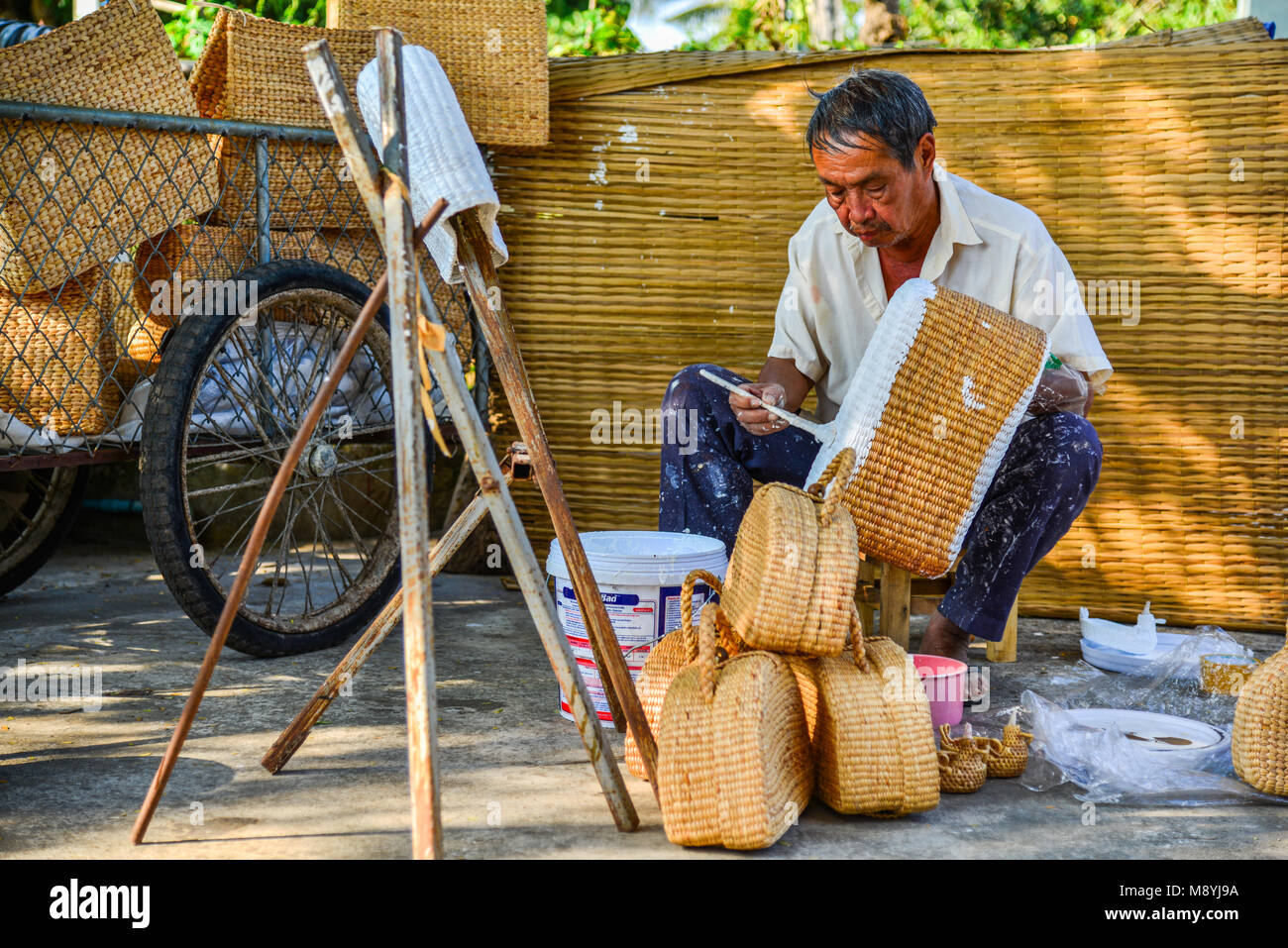 Man carry bamboo hi-res stock photography and images - Page 2 - Alamy