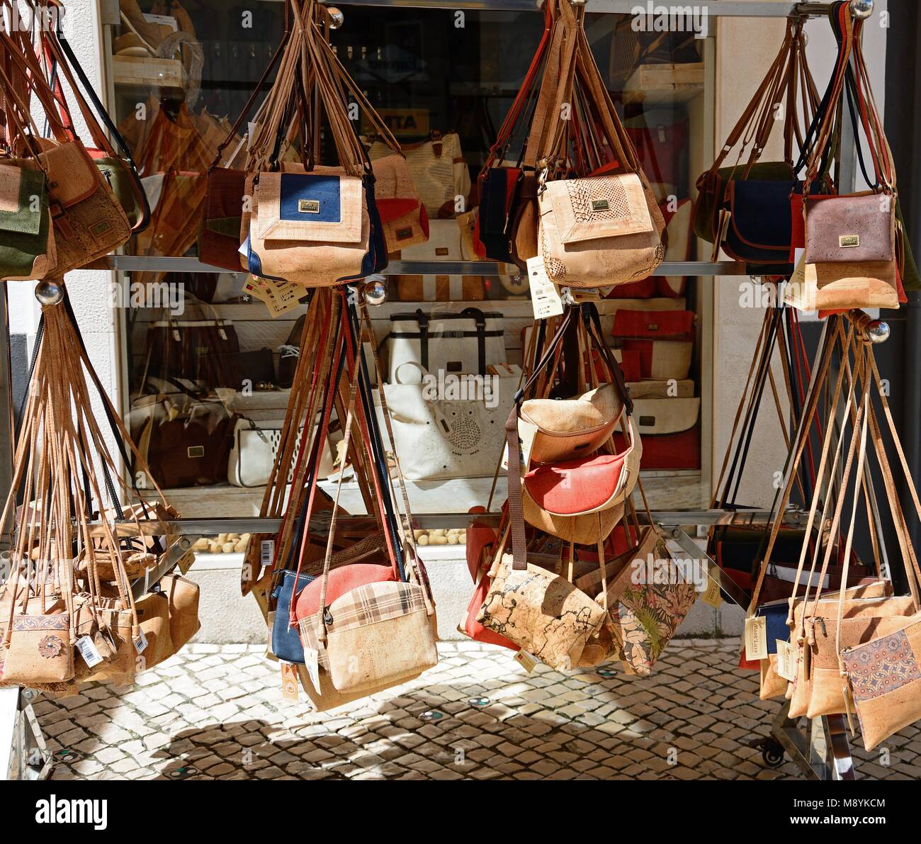 Portuguese cork handbags for sale in an old town shop, Lagos, Algarve,  Portugal, Europe Stock Photo - Alamy