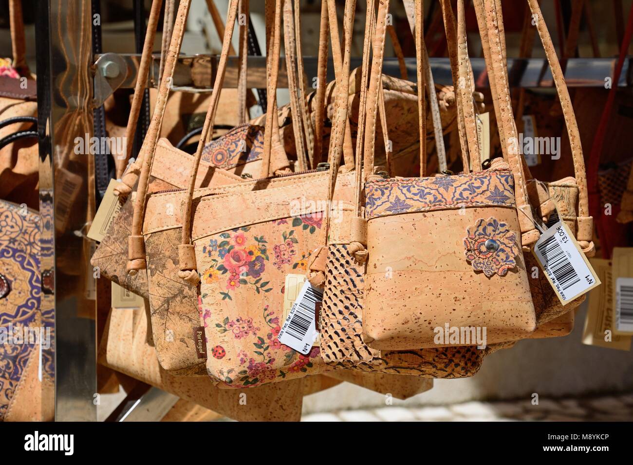 Portuguese cork handbags for sale at an old town shop, Lagos, Algarve, Portugal, Europe. Stock Photo