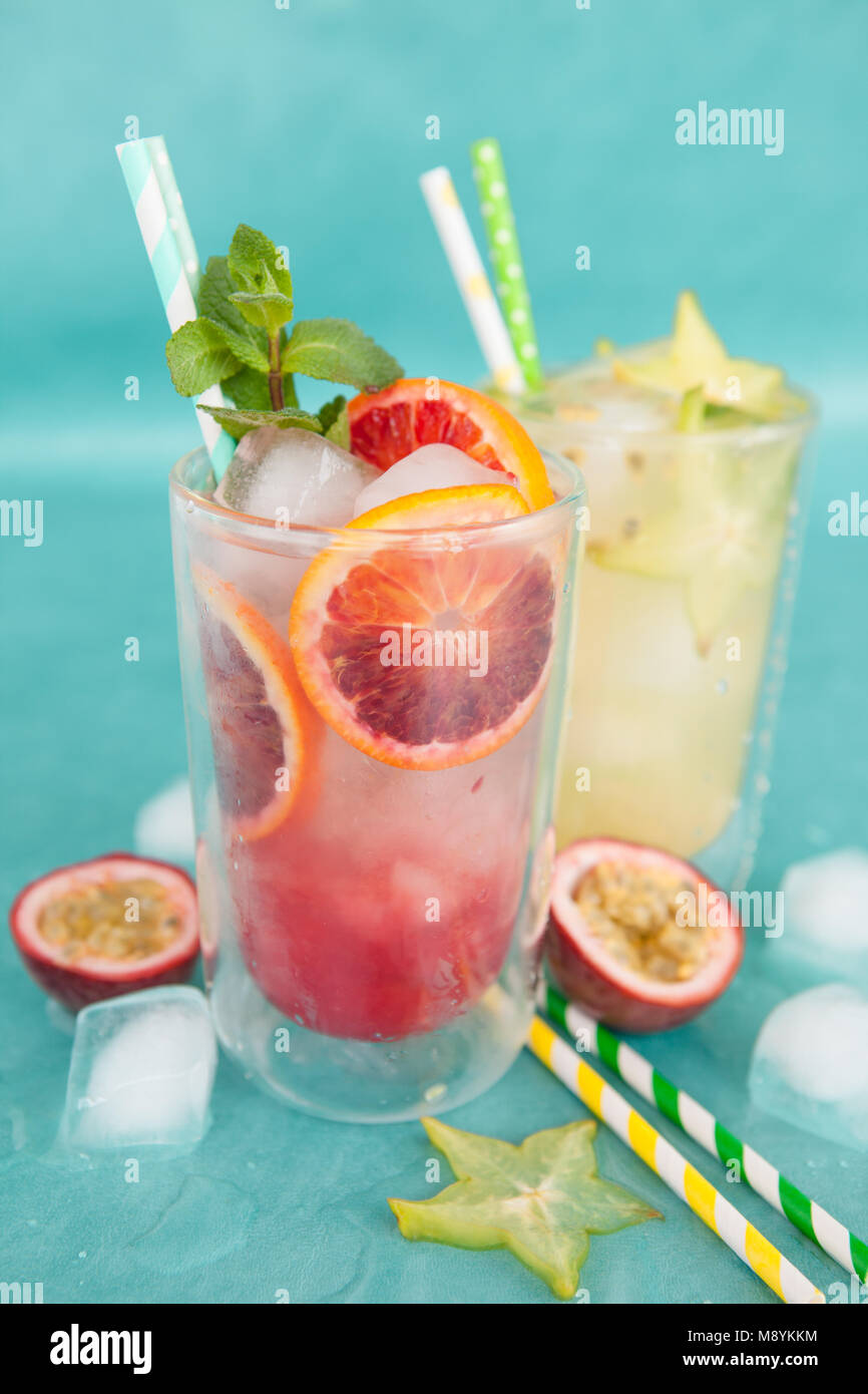 Cold cocktail with fresh bloodoranges and mint leaves Stock Photo