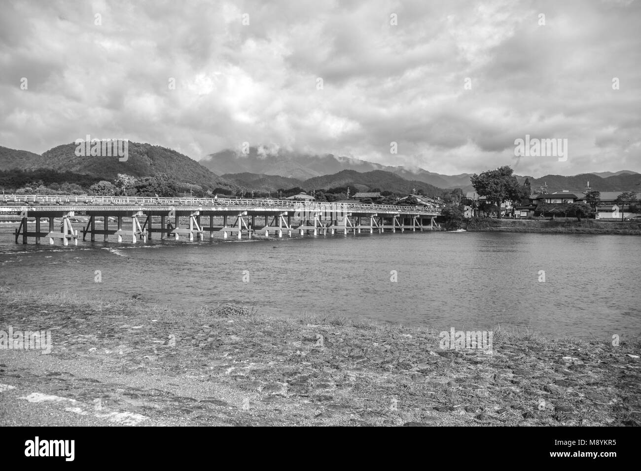 Togetsukyo Bridge Over The Katsura River At Arashiyama Kyoto Japan In Black And White Stock Photo