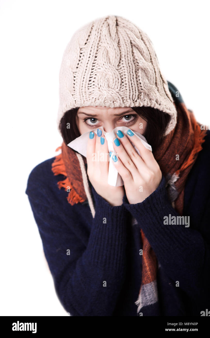 Flu and cold woman on the sofa feeling ill. Stock Photo