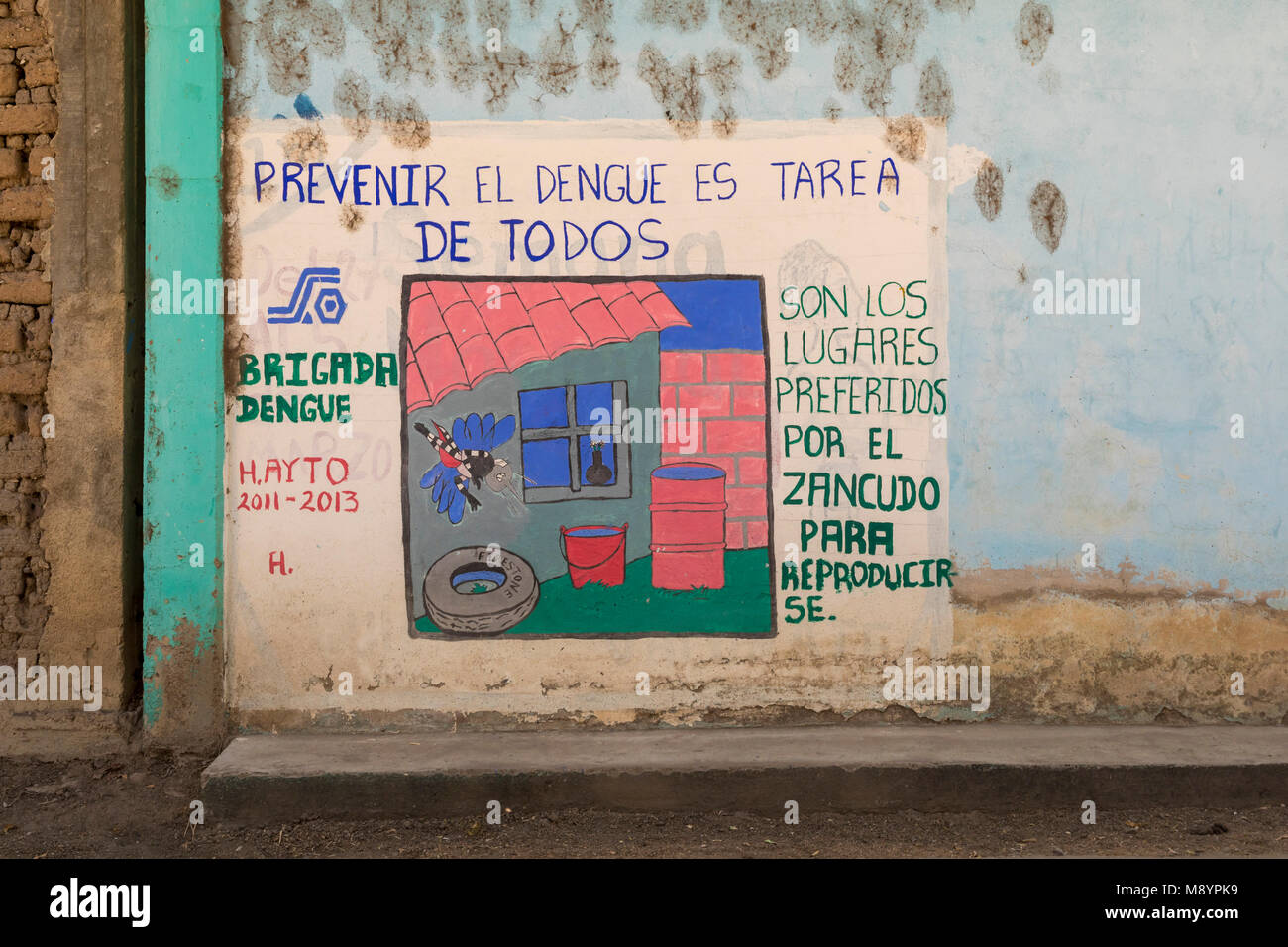 San Juan Teitipac, Oaxaca, Mexico - A sign on a building says that preventing dengue fever is the job of everyone. It points out that mosquitos which  Stock Photo