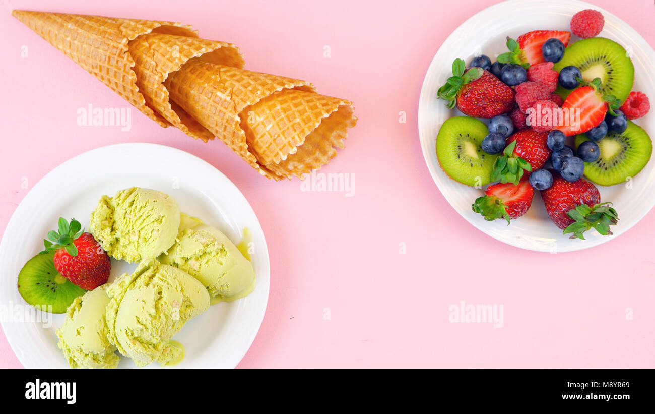Serving Matcha Green Tea ice cream with waffle cones and fresh fruit on