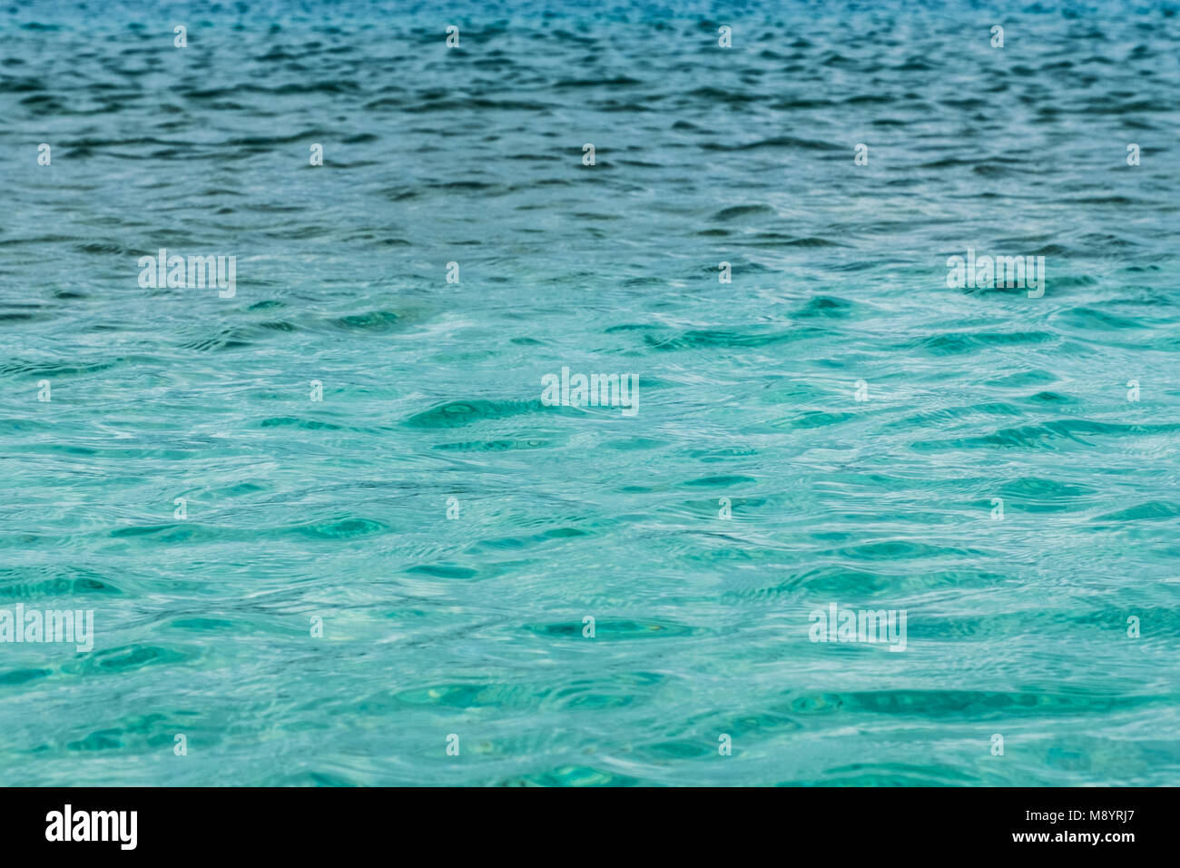 ocean water surface - turquoise water texture - Stock Photo
