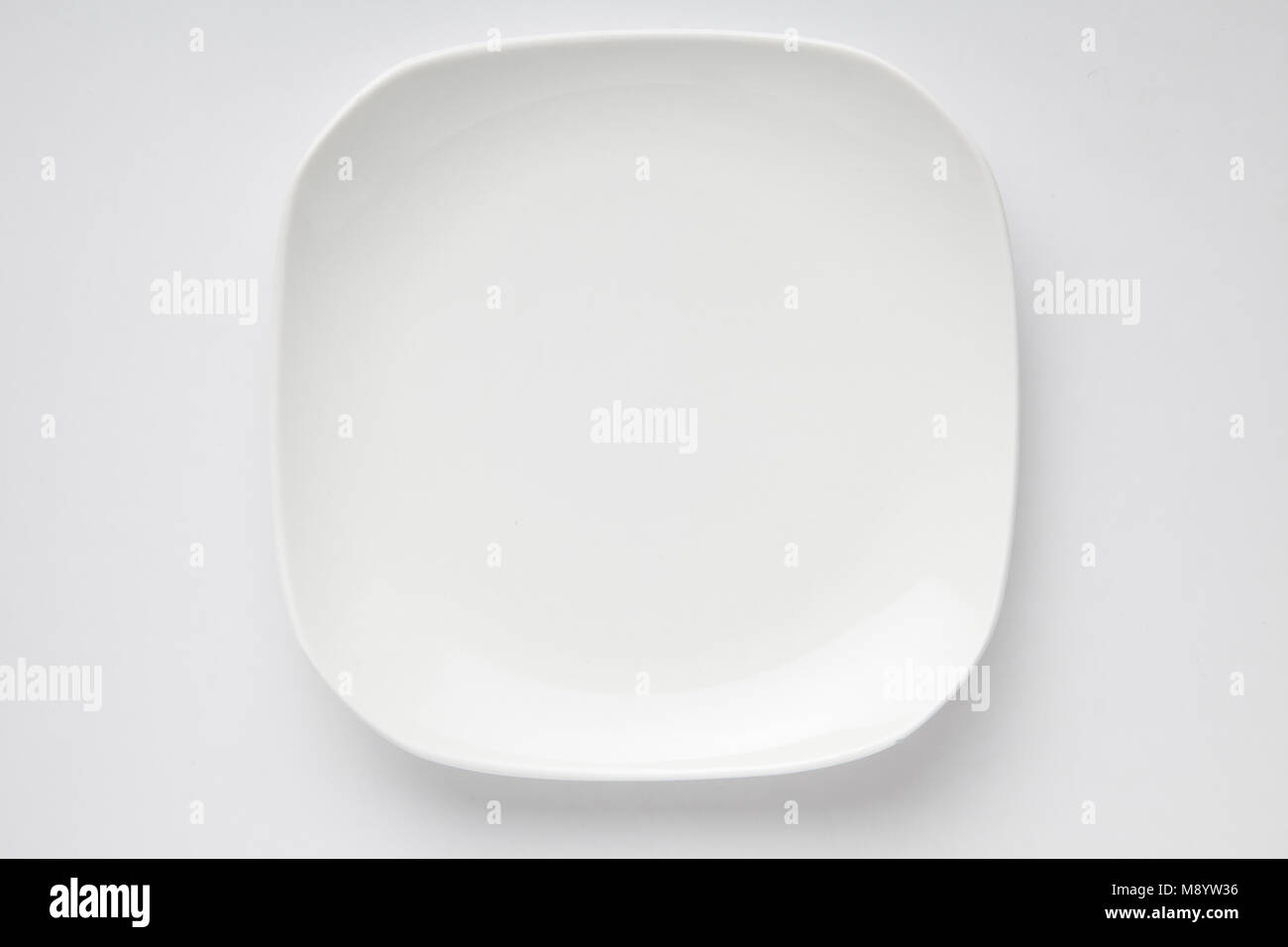 White square plate Stock Photo Alamy