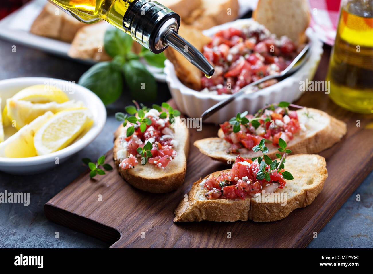 Roasted tomatoes bruschetta with thyme Stock Photo