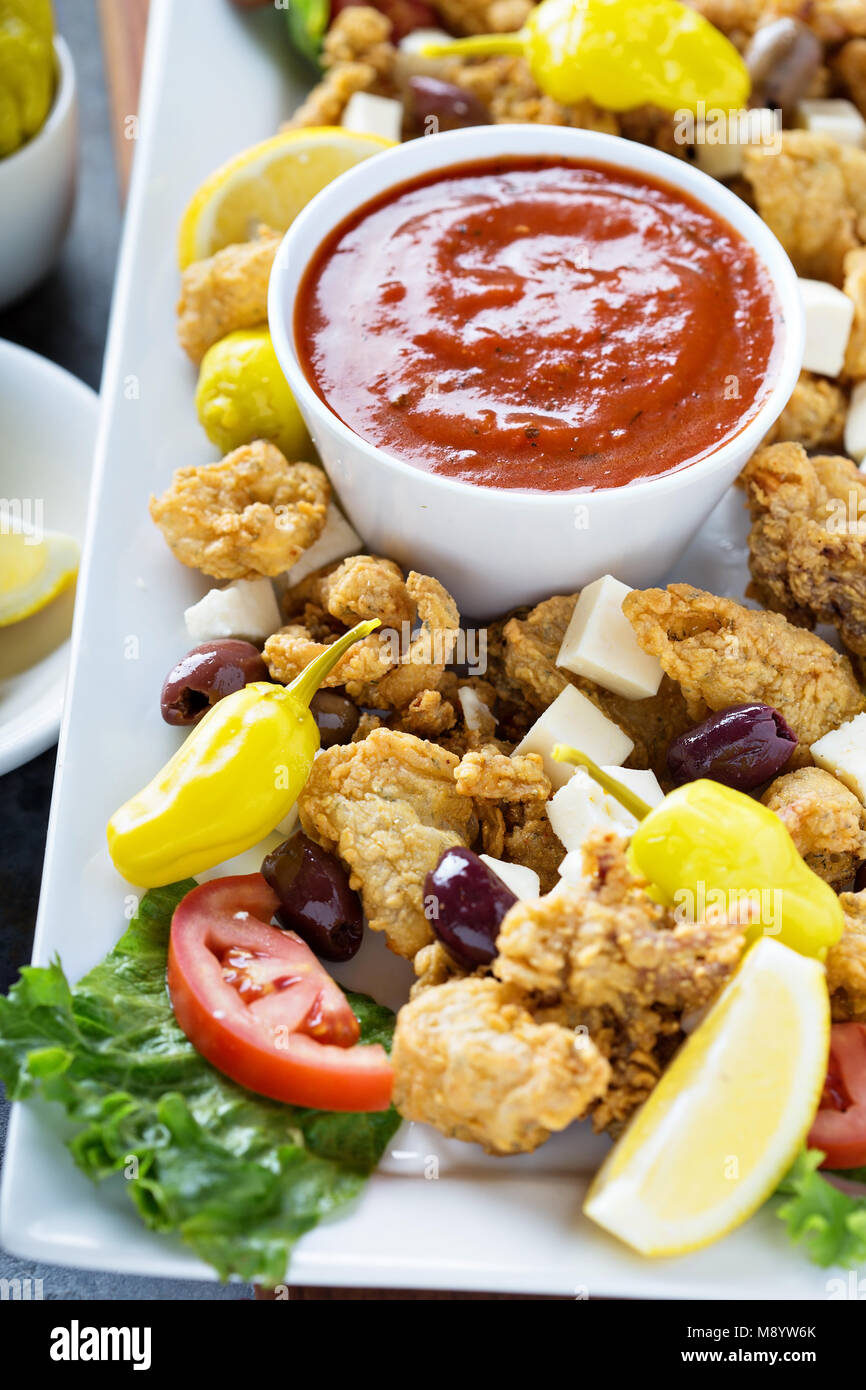 Fried calamari with marinara sauce Stock Photo Alamy
