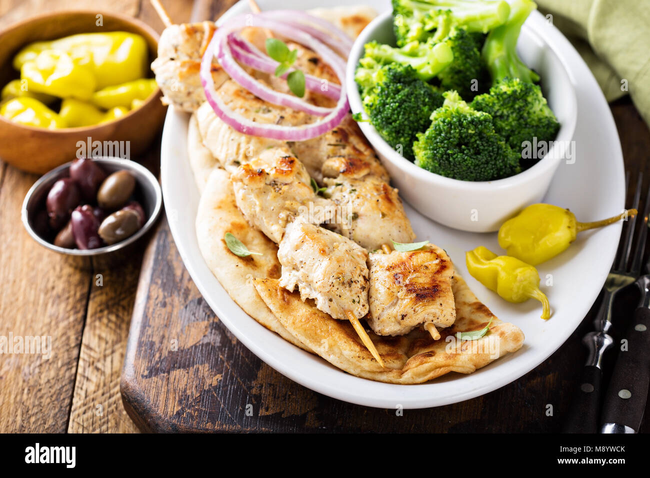Grilled chicken kebabs on a pita Stock Photo
